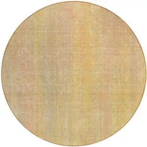 Photo of 8' Round Yellow and Orange Round Striped Washable Non Skid Indoor Outdoor Area Rug
