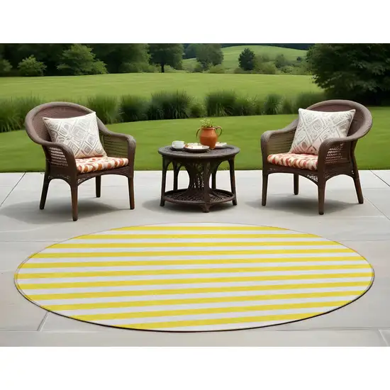 Yellow and White Round Striped Washable Indoor Outdoor Area Rug Photo 1