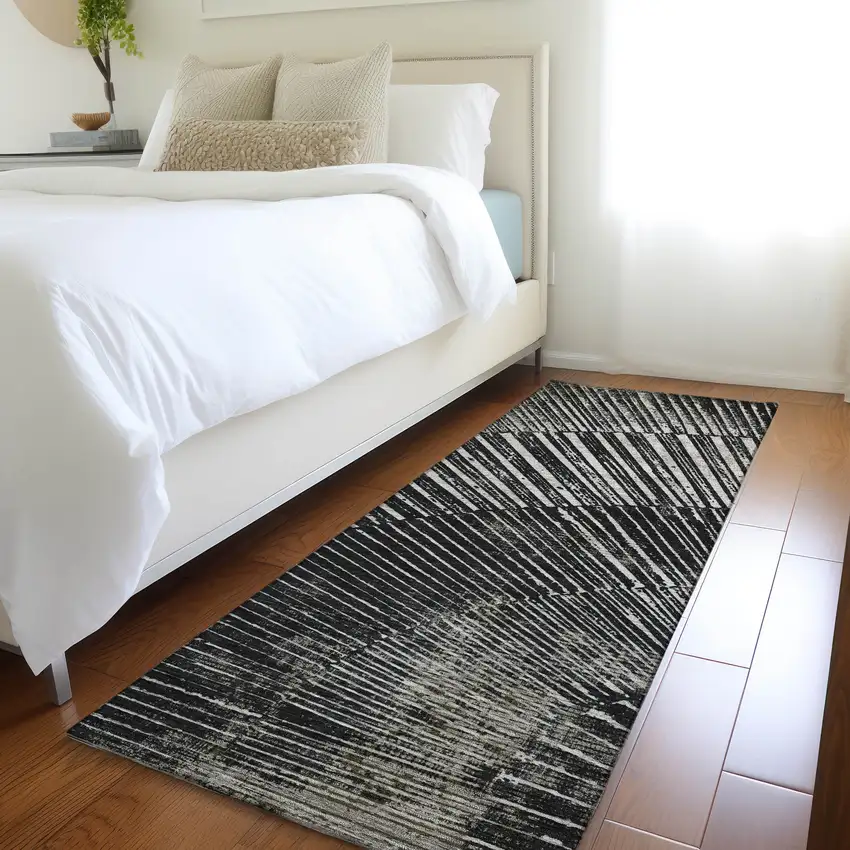 8' Runner Black and Ivory Abstract Washable Non Skid Indoor Outdoor Runner Rug Photo 9