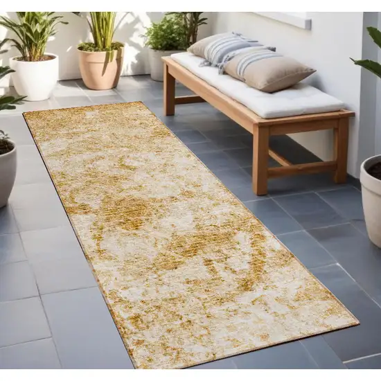 Cream and Gold Abstract Washable Non Skid Indoor Outdoor Runner Rug Photo 1