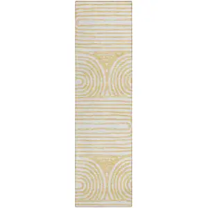 Photo of 8' Runner Gold and White Abstract Washable Non Skid Indoor Outdoor Runner Rug