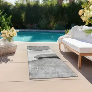 Photo of 8' Runner Gray and Black Abstract Washable Non Skid Indoor Outdoor Runner Rug