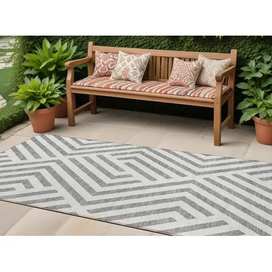 8' Gray And Ivory Geometric Washable Indoor Outdoor Runner Rug Photo 1