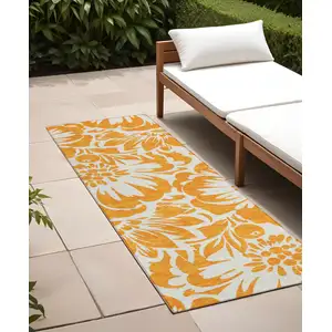 Photo of 8' Runner Orange and White Floral Washable Non Skid Indoor Outdoor Runner Rug