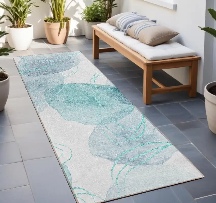 Teal and Ivory Abstract Washable Non Skid Indoor Outdoor Runner Rug Photo 1
