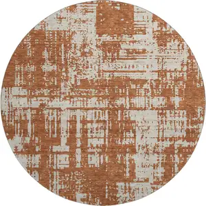 Photo of 8' Rust And Beige Abstract Washable Round Rug With UV Protection