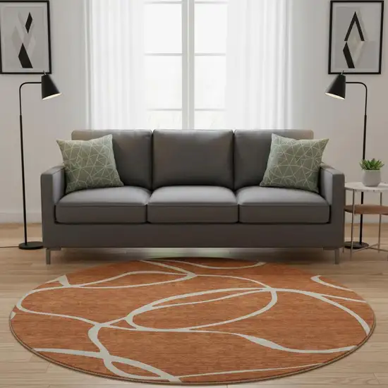 8' Rust And Beige Abstract Washable Round Rug With UV Protection Photo 2