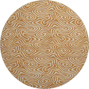 Photo of 8' Rust And Beige Abstract Washable Round Rug With UV Protection