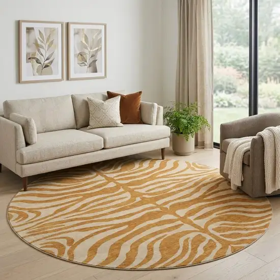 8' Rust And Beige Animal Print Washable Round Rug With UV Protection Photo 1