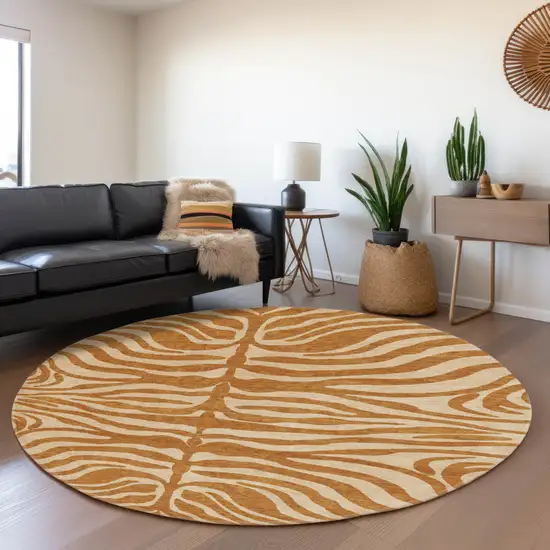 8' Rust And Beige Animal Print Washable Round Rug With UV Protection Photo 4
