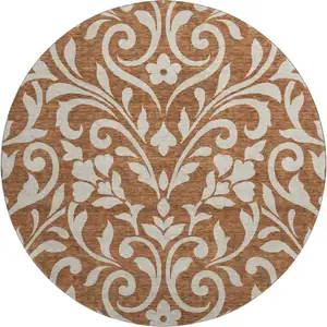 Photo of 8' Rust And Beige Floral Washable Round Rug With UV Protection