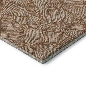 Photo of 8' Rust And Beige Floral Washable Round Rug With UV Protection