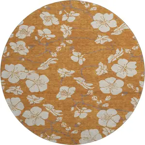 Photo of 8' Rust And Beige Floral Washable Round Rug With UV Protection