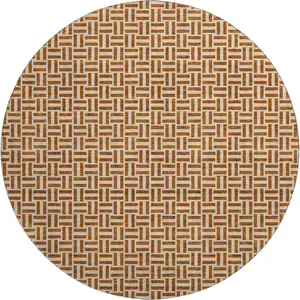 Photo of 8' Rust And Beige Geometric Washable Round Rug With UV Protection