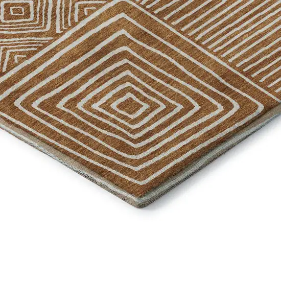 8' Rust And Beige Geometric Washable Round Rug With UV Protection Photo 6