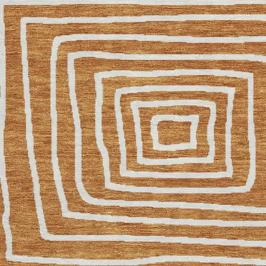 8' Rust And Beige Geometric Washable Round Rug With UV Protection Photo 3