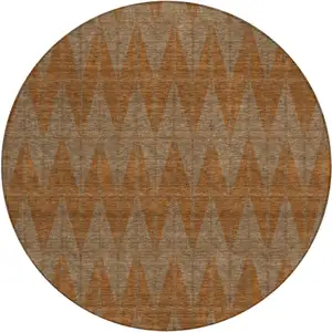 Photo of 8' Rust And Beige Round Geometric Washable Indoor Outdoor Area Rug