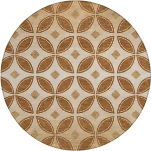 Photo of 8' Rust And Beige Round Geometric Washable Indoor Outdoor Area Rug