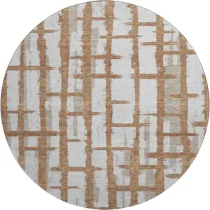 Photo of 8' Rust And Beige Striped Washable Round Rug With UV Protection