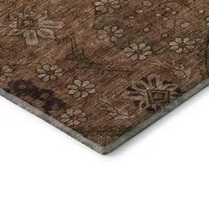 Photo of 8' Rust And Copper Floral Washable Round Rug With UV Protection