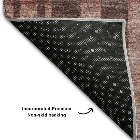 8' Rust And Coral Striped Washable Round Rug With UV Protection Photo 4