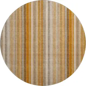 Photo of 8' Rust And Gray Striped Washable Round Rug With UV Protection