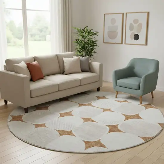 8' Rust And Ivory Abstract Geometric Washable Round Rug With UV Protection Photo 1