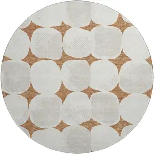 Photo of 8' Rust And Ivory Abstract Geometric Washable Round Rug With UV Protection
