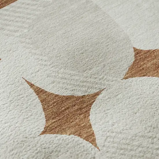 8' Rust And Ivory Abstract Geometric Washable Round Rug With UV Protection Photo 9