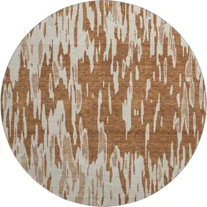 Photo of 8' Rust And Ivory Abstract Washable Round Rug With UV Protection
