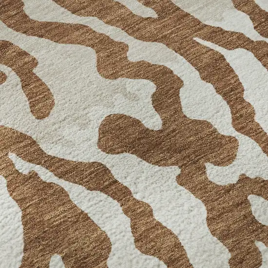 8' Rust And Ivory Animal Print Washable Round Rug With UV Protection Photo 9