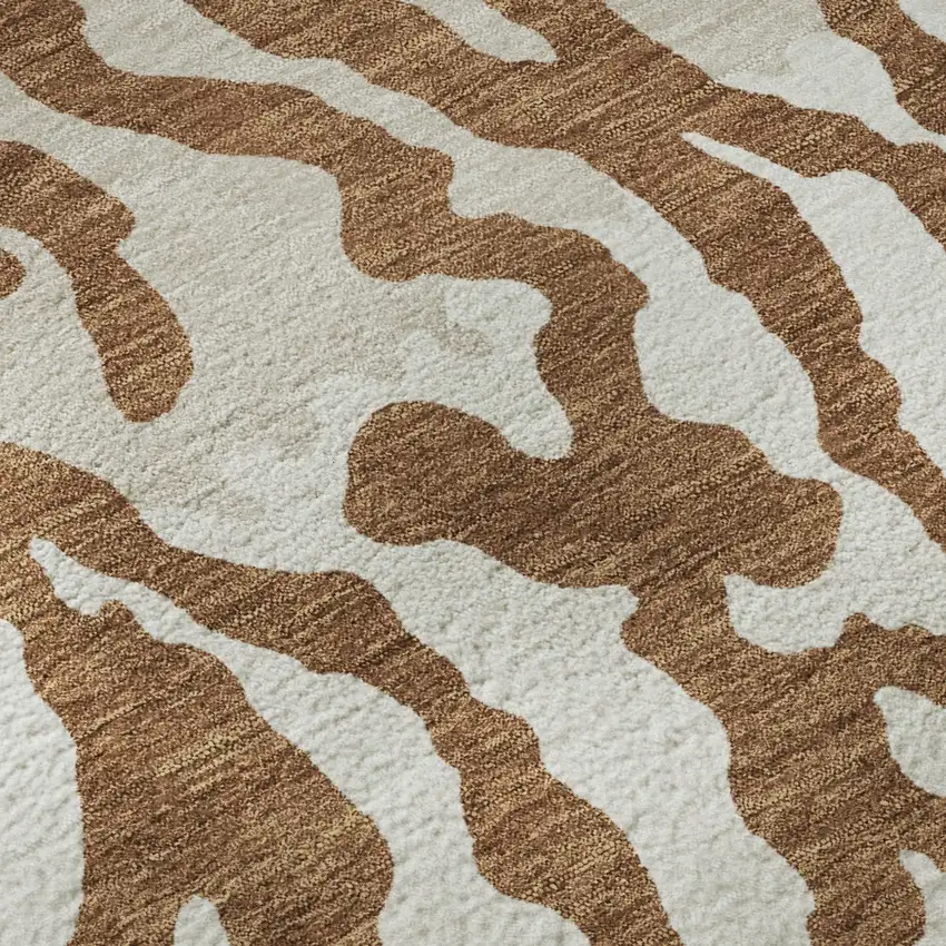 8' Rust And Ivory Animal Print Washable Round Rug With UV Protection Photo 9