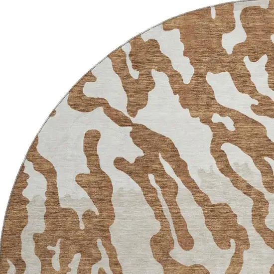 8' Rust And Ivory Animal Print Washable Round Rug With UV Protection Photo 4