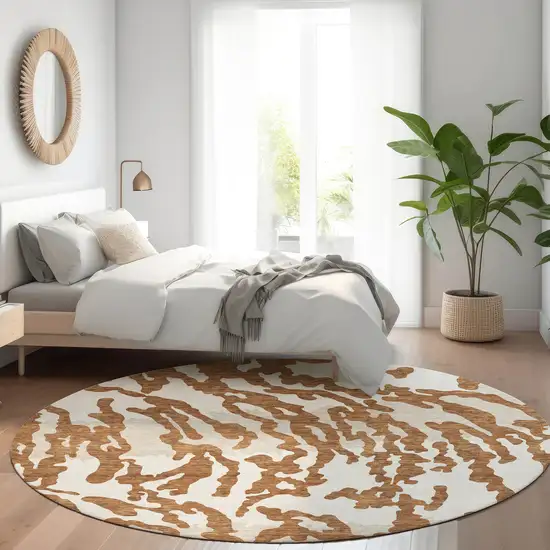 8' Rust And Ivory Animal Print Washable Round Rug With UV Protection Photo 5