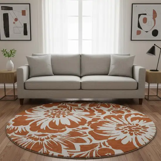 8' Rust And Ivory Floral Washable Round Rug With UV Protection Photo 1
