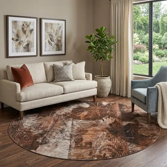 8' Rust And Ivory Floral Washable Round Rug With UV Protection Photo 1