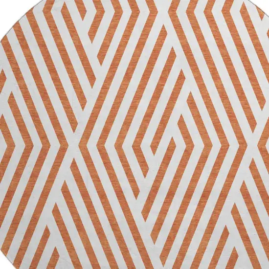 8' Rust And Ivory Geometric Washable Round Rug With UV Protection Photo 4