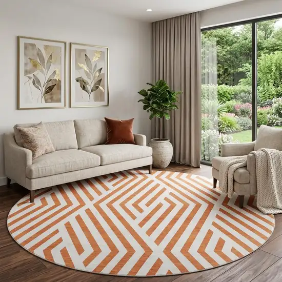 8' Rust And Ivory Geometric Washable Round Rug With UV Protection Photo 1