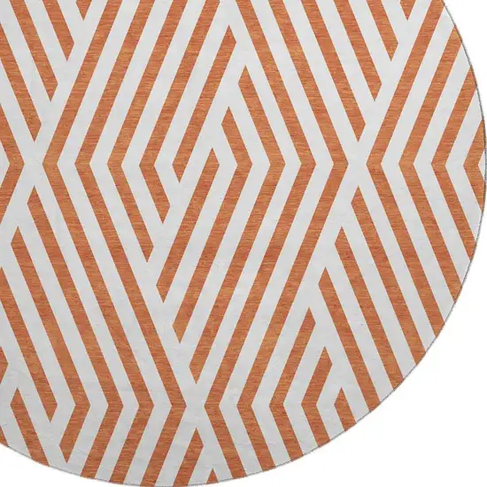 8' Rust And Ivory Geometric Washable Round Rug With UV Protection Photo 6