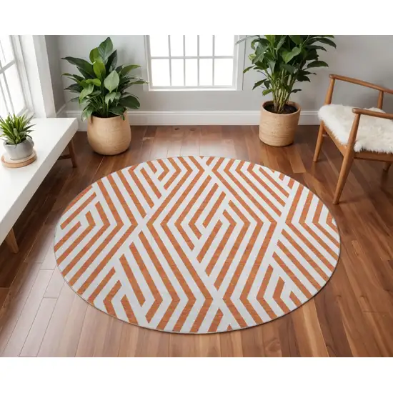 8' Rust And Ivory Geometric Washable Round Rug With UV Protection Photo 2