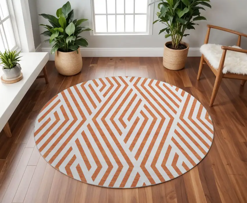 8' Rust And Ivory Geometric Washable Round Rug With UV Protection Photo 2