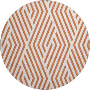 Photo of 8' Rust And Ivory Geometric Washable Round Rug With UV Protection