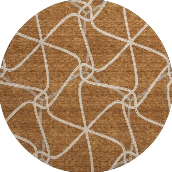 8' Rust And Ivory Geometric Washable Round Rug With UV Protection Photo 3