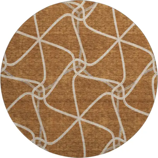 8' Rust And Ivory Geometric Washable Round Rug With UV Protection Photo 1