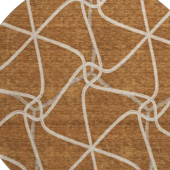 8' Rust And Ivory Geometric Washable Round Rug With UV Protection Photo 2