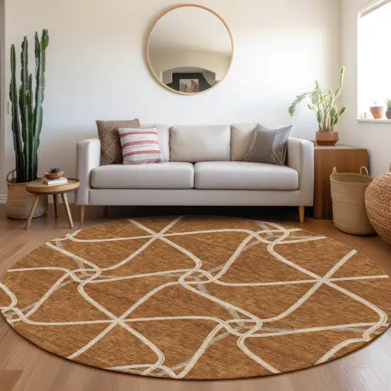 8' Rust And Ivory Geometric Washable Round Rug With UV Protection Photo 4