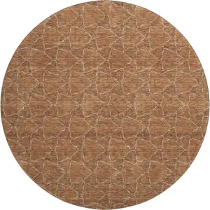 Photo of 8' Rust And Ivory Geometric Washable Round Rug With UV Protection