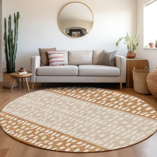 8' Rust And Ivory Geometric Washable Round Rug With UV Protection Photo 4