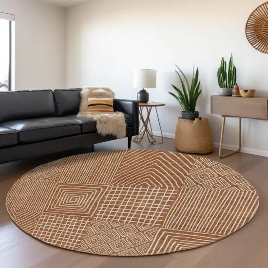 8' Rust And Ivory Geometric Washable Round Rug With UV Protection Photo 4