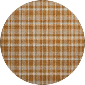 Photo of 8' Rust And Ivory Plaid Washable Round Rug With UV Protection